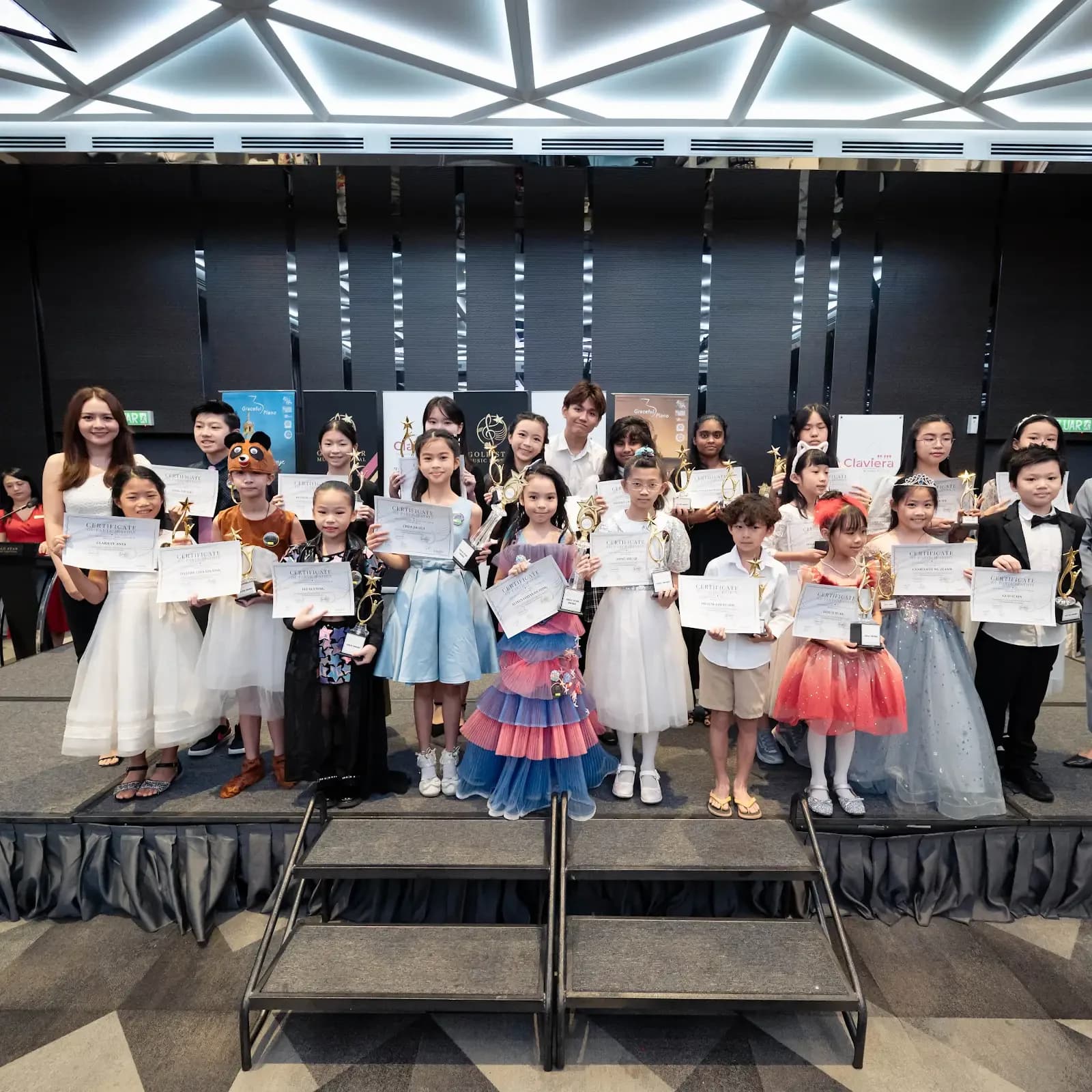 Young Festival musicians share a stage after their performances in 2023